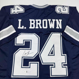 Camiseta de fútbol azul de Dallas de Larry Brown autografiada/firmada Beckett BAS COA
