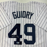 Camiseta de béisbol a rayas de Nueva York autografiada/firmada por Ron Guidry Beckett BAS COA