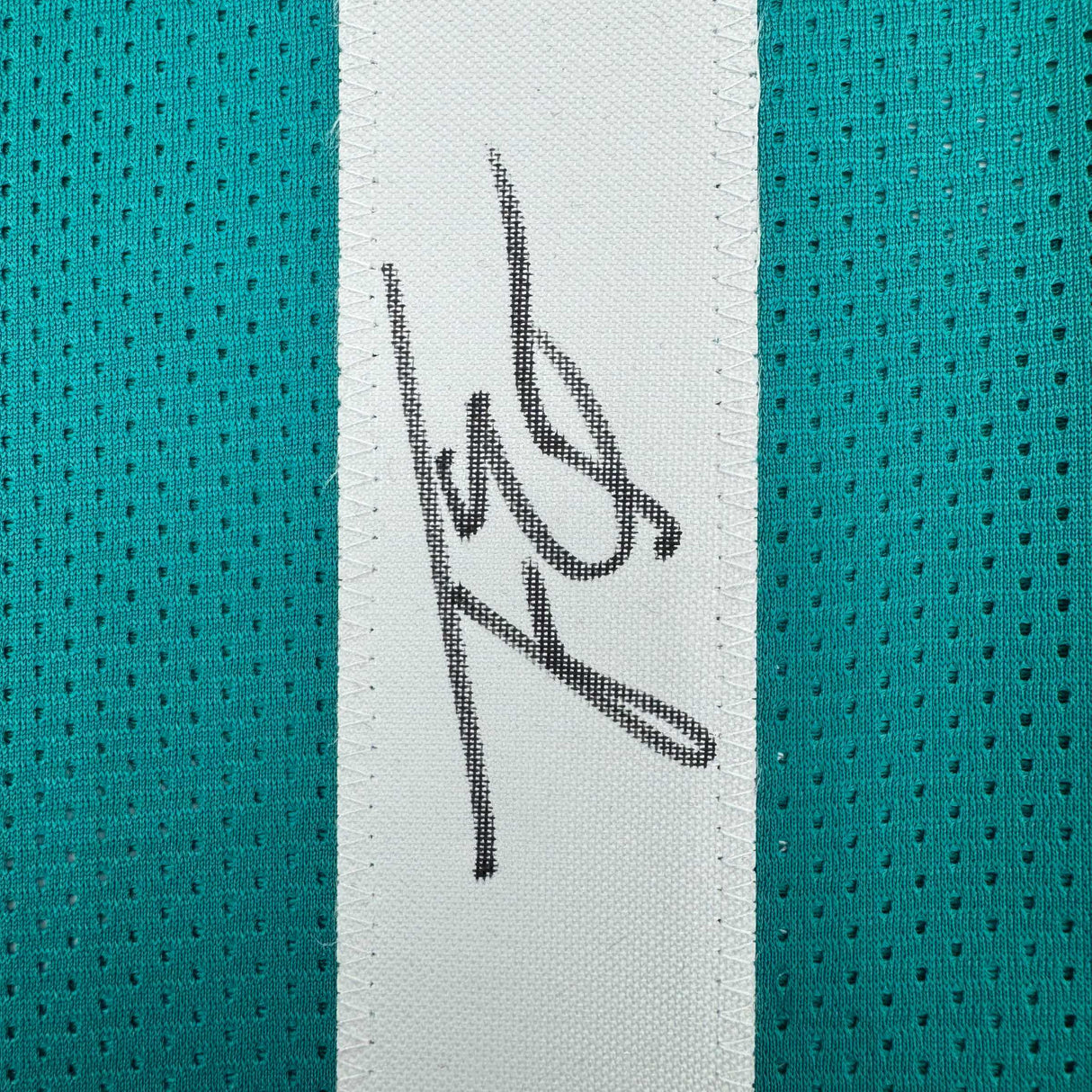 Camiseta de fútbol americano autografiada/firmada de Travis Etienne Jr. Jacksonville Teal Beckett BAS COA