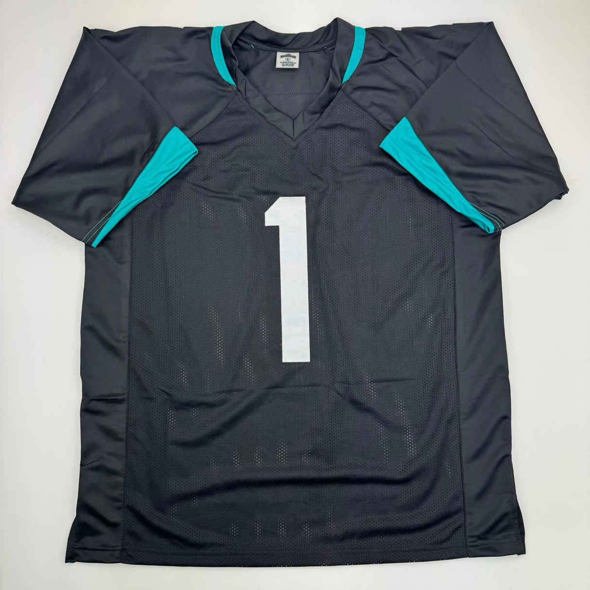Camiseta de fútbol americano autografiada/firmada de Travis Etienne Jr. Jacksonville, color negro, Beckett BAS COA
