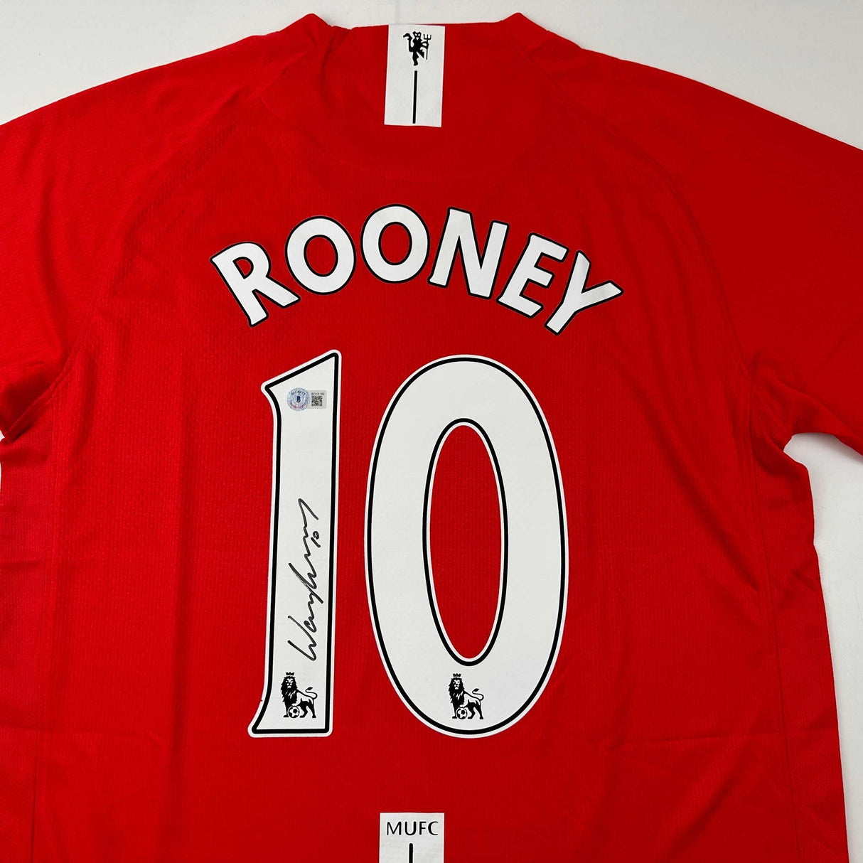 Camiseta de fútbol roja del Manchester United 2008 de Wayne Rooney autografiada y firmada por Beckett BAS COA