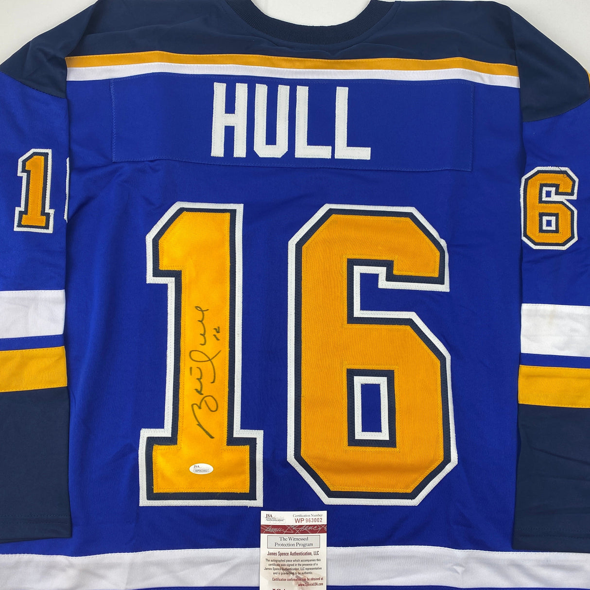 Camiseta de hockey autografiada/firmada por Brett Hull St. Louis con números azules y amarillos (JSA COA)