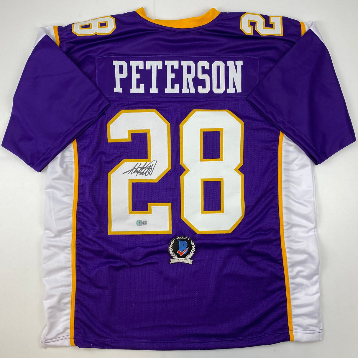 Camiseta de fútbol morado de Minnesota autografiada/firmada por Adrian Peterson Beckett BAS COA