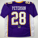 Camiseta de fútbol morado de Minnesota autografiada/firmada por Adrian Peterson Beckett BAS COA