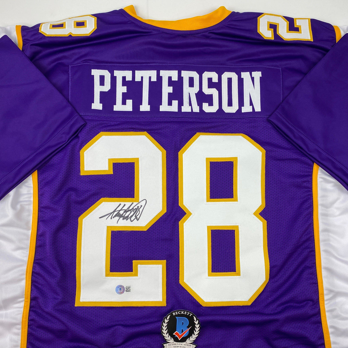 Camiseta de fútbol morado de Minnesota autografiada/firmada por Adrian Peterson Beckett BAS COA
