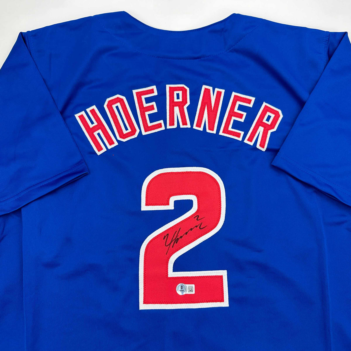 Camiseta de béisbol azul de Chicago de Nico Hoerner autografiada/firmada Beckett BAS COA