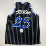 Camiseta de baloncesto de rayas negras de Orlando autografiada y firmada por Nick Anderson. Certificado de autenticidad/ADN.