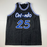 Camiseta de baloncesto de rayas negras de Orlando autografiada y firmada por Nick Anderson. Certificado de autenticidad/ADN.