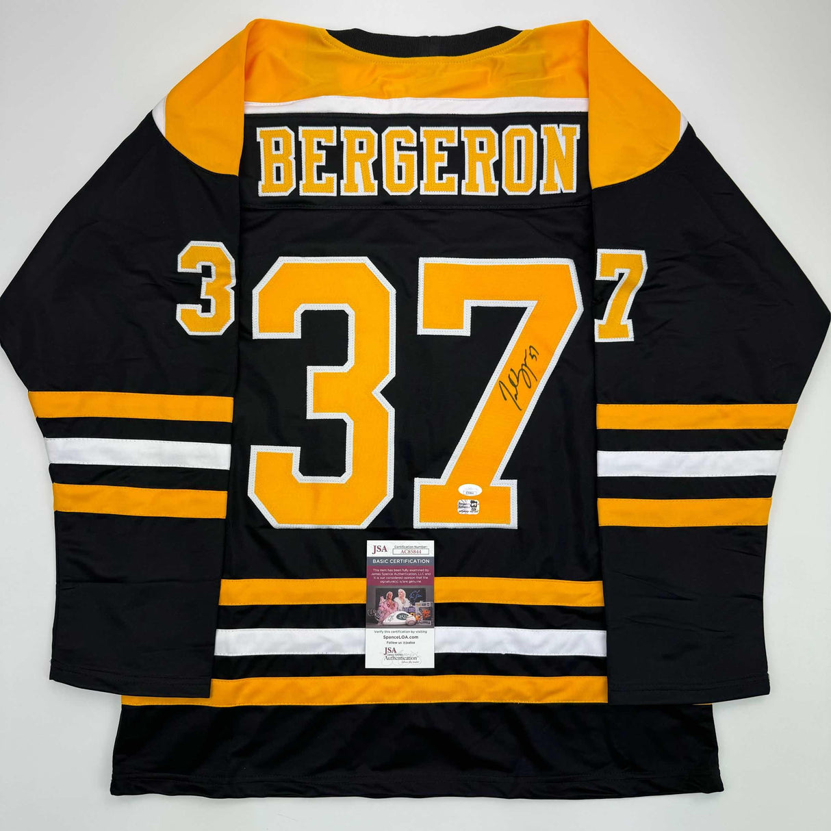 Camiseta de hockey negra de Boston autografiada/firmada por Patrice Bergeron (JSA COA)
