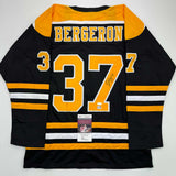 Camiseta de hockey negra de Boston autografiada/firmada por Patrice Bergeron (JSA COA)