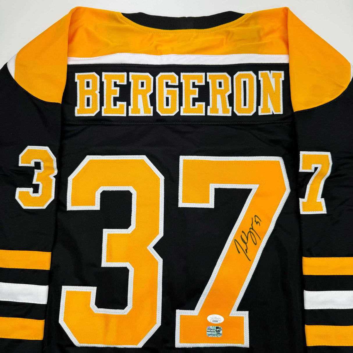 Camiseta de hockey negra de Boston autografiada/firmada por Patrice Bergeron (JSA COA)
