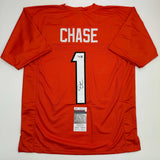 Autographed/Signed Ja'Marr Chase Cincinnati Orange Football Jersey JSA COA