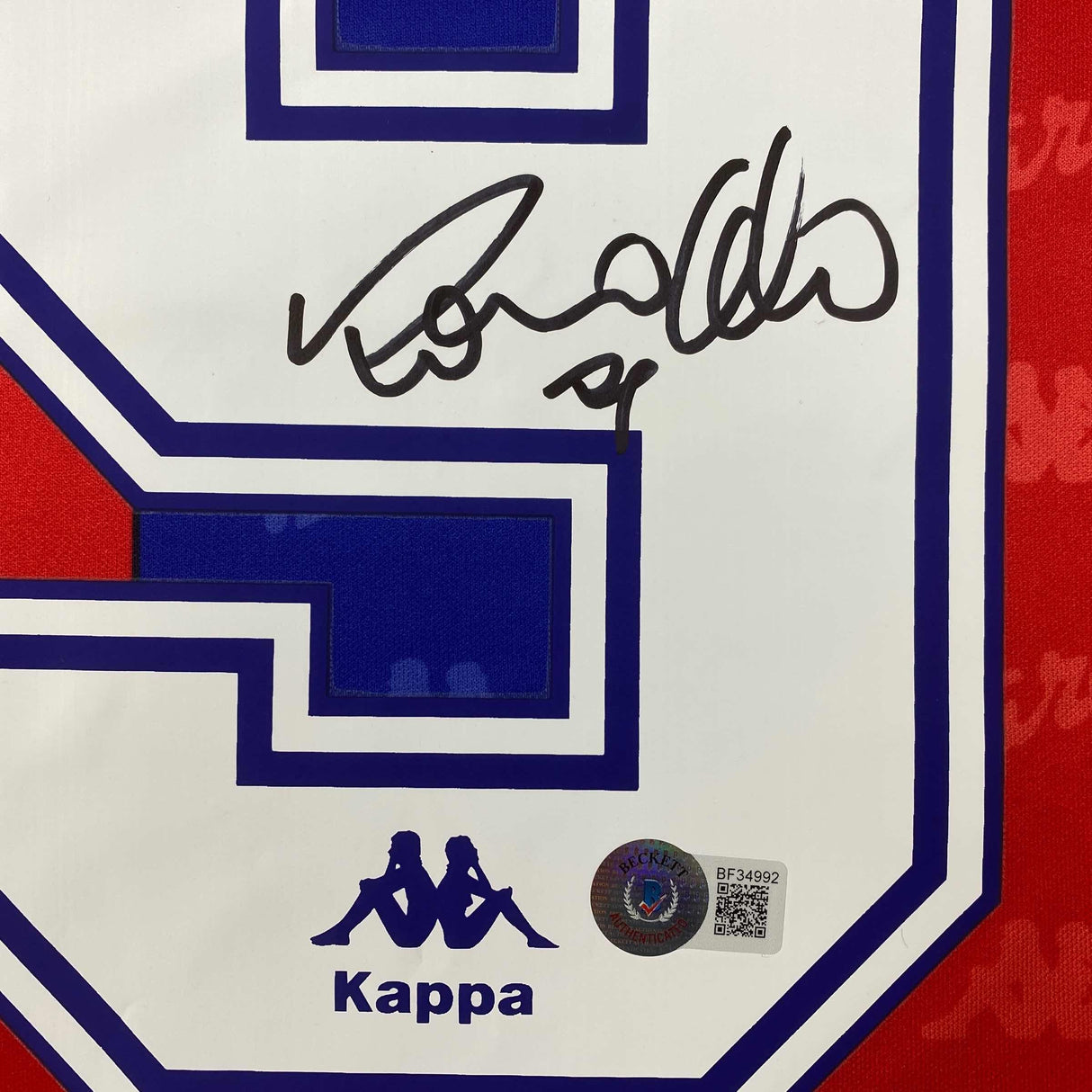 Camiseta de fútbol roja/azul del FC Barcelona de Ronaldo Nazario autografiada/firmada Beckett BAS COA