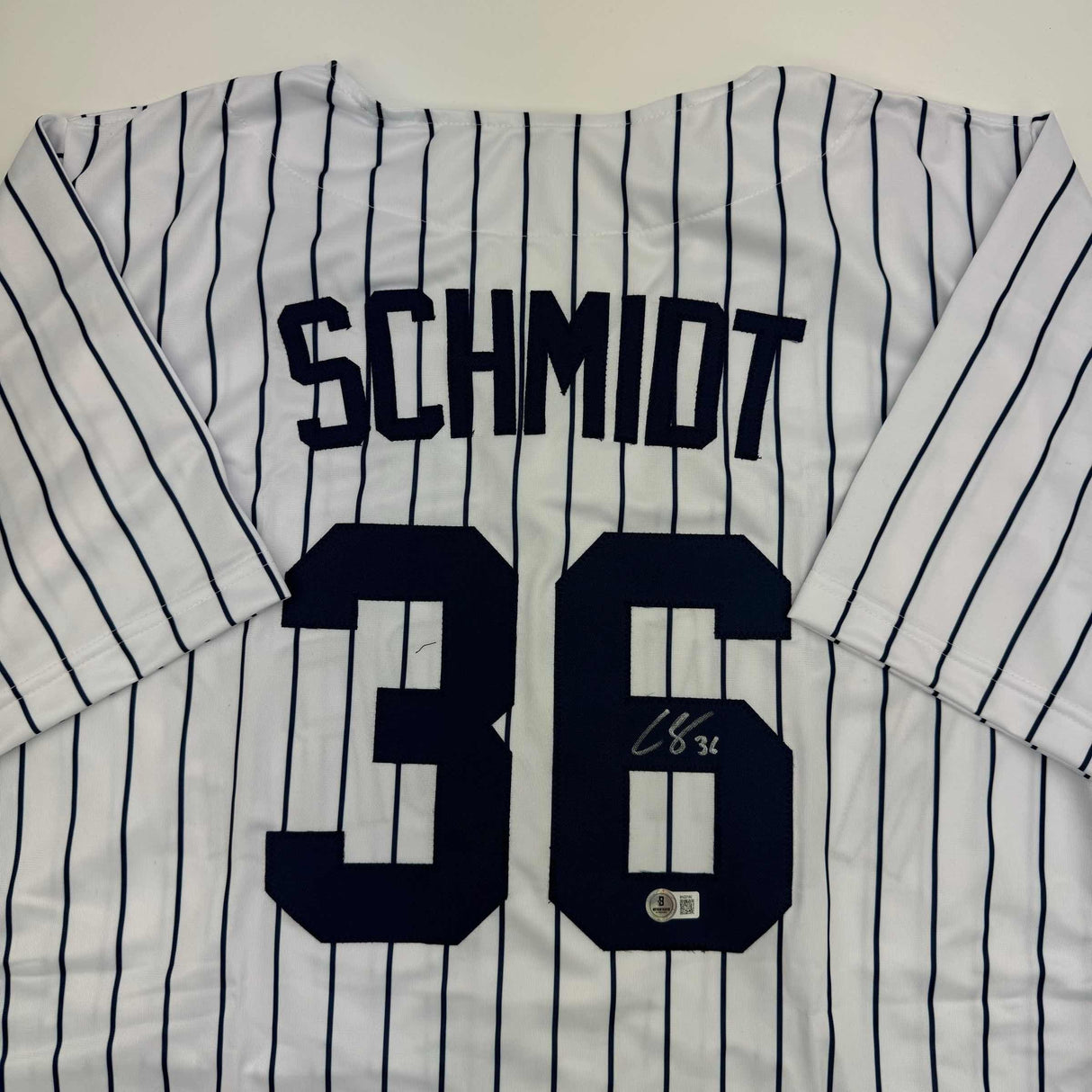 Autographed/Signed Clarke Schmidt New York Pinstripe Baseball Jersey Beckett BAS COA