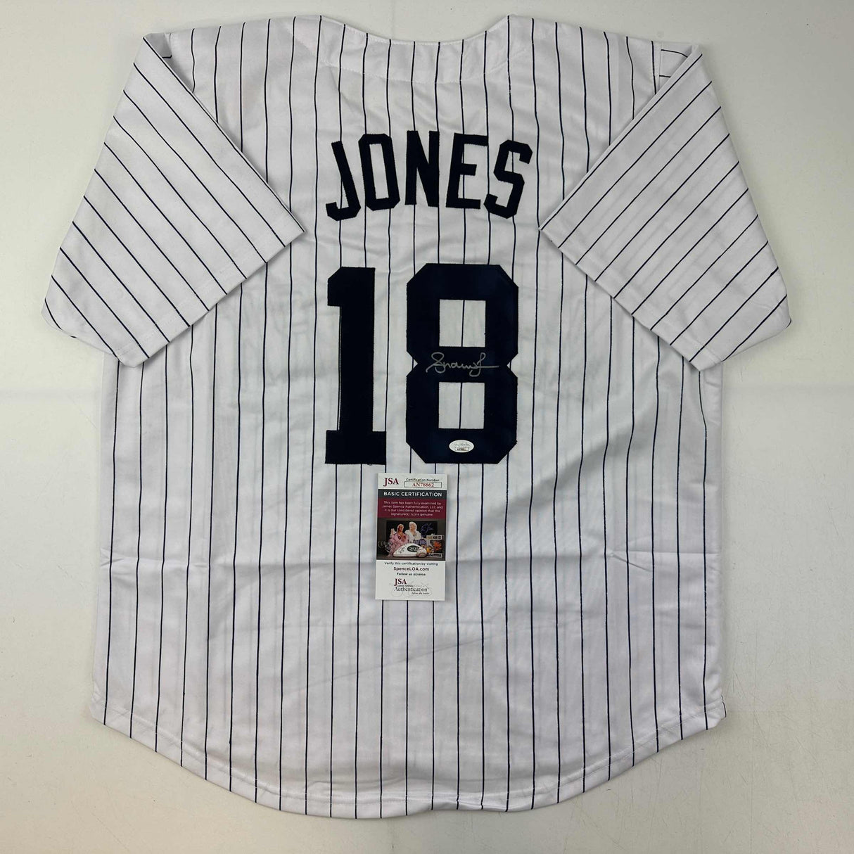 Camiseta de béisbol a rayas de Nueva York autografiada/firmada por Andruw Jones (JSA COA)