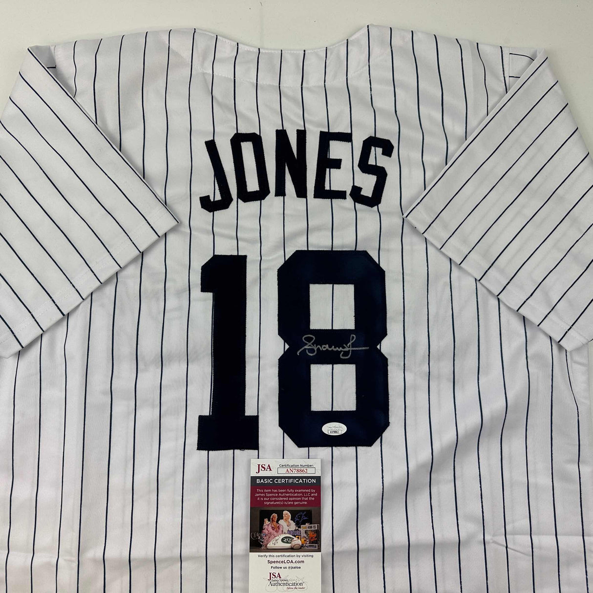 Camiseta de béisbol a rayas de Nueva York autografiada/firmada por Andruw Jones (JSA COA)
