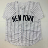 Camiseta de béisbol a rayas de Nueva York autografiada/firmada por Andruw Jones (JSA COA)