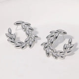 Pendientes de acero inoxidable de temperamento simple con baño de oro de 18 quilates que no se decoloran