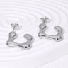 Pendientes de acero inoxidable de temperamento simple con baño de oro de 18 quilates que no se decoloran