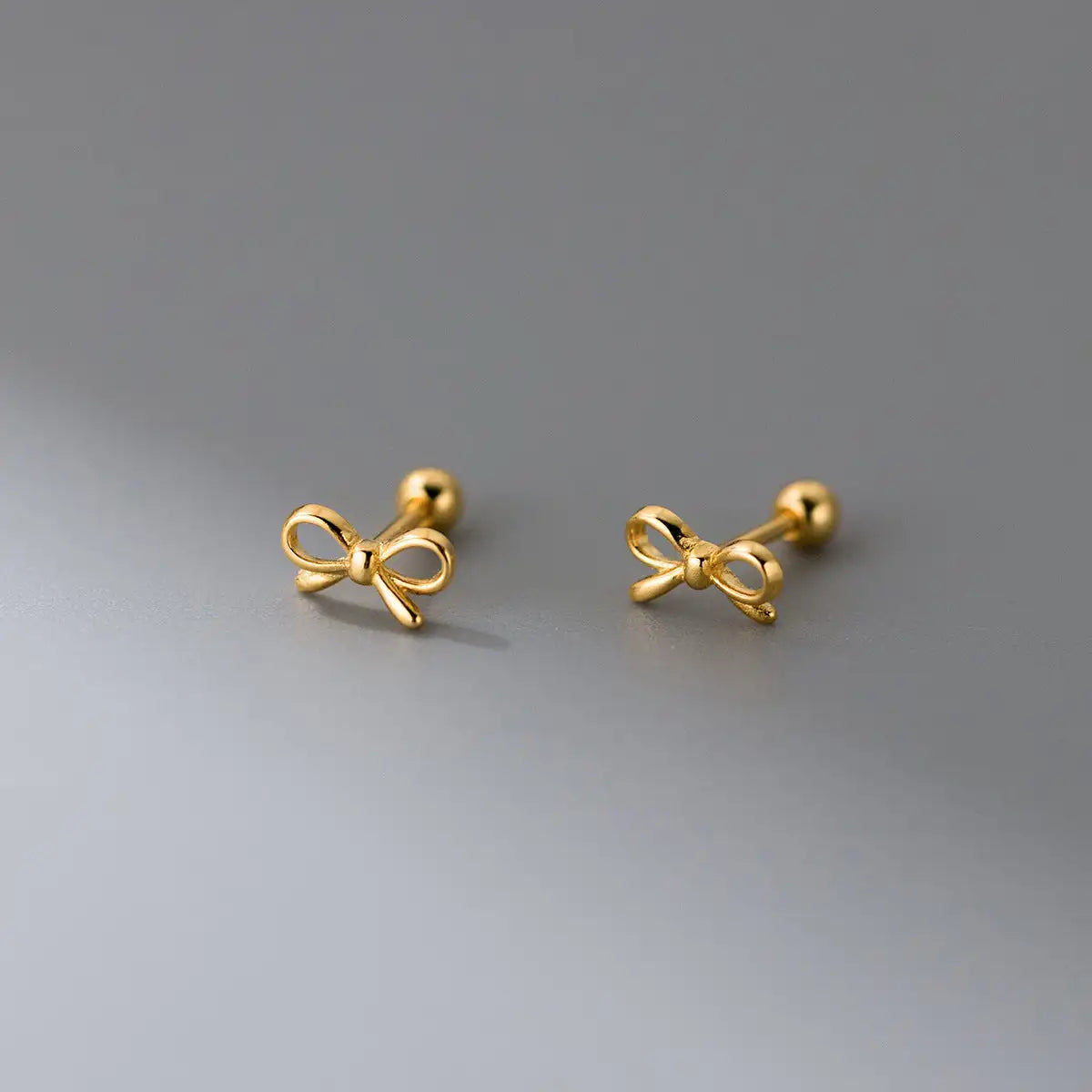 Fashion Hollowed-out Bowknot Thread Stud Earrings - Lootquake
