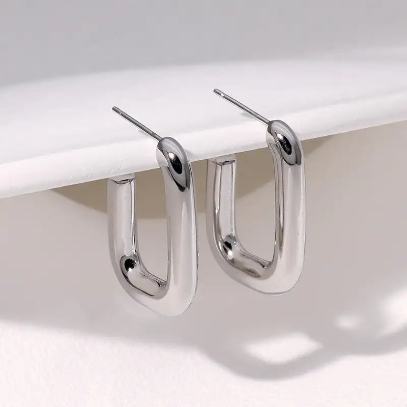 Pendientes de acero inoxidable de temperamento simple con baño de oro de 18 quilates que no se decoloran