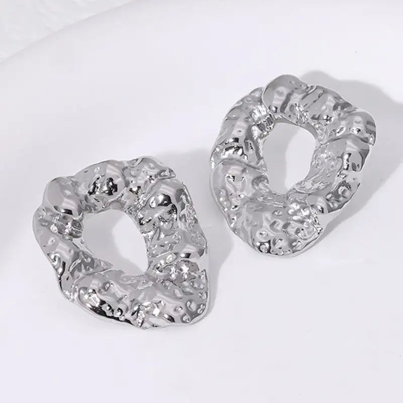 Pendientes de acero inoxidable de temperamento simple con baño de oro de 18 quilates que no se decoloran