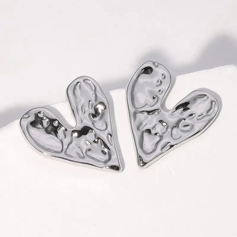 Pendientes de acero inoxidable de temperamento simple con baño de oro de 18 quilates que no se decoloran