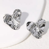 Pendientes de acero inoxidable de temperamento simple con baño de oro de 18 quilates que no se decoloran