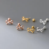Fashion Hollowed-out Bowknot Thread Stud Earrings - Lootquake