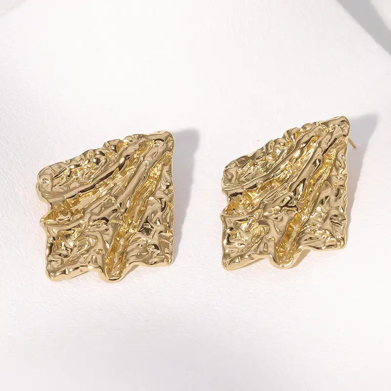Pendientes de acero inoxidable de temperamento simple con baño de oro de 18 quilates que no se decoloran