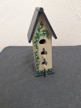 Vintage handcrafted three post tall birdhouse