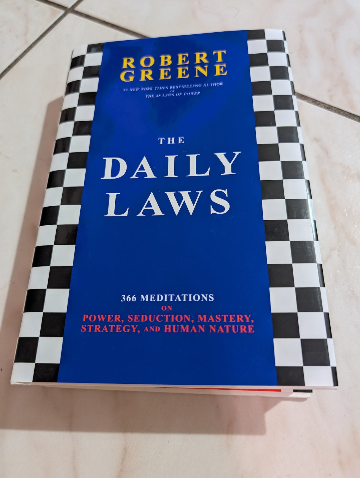 The Daily Laws: 366 Meditations on Power, Seduction, Mastery, Strategy, and Human Nature Book by Robert Greene