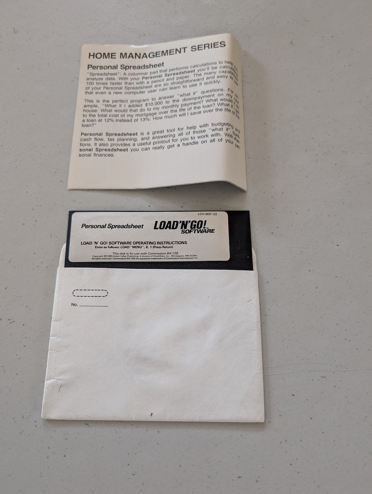 Personal Spreadsheet LOAD'N'GO!Â software floppy disk for Commodore 64/128 with instructions 1985