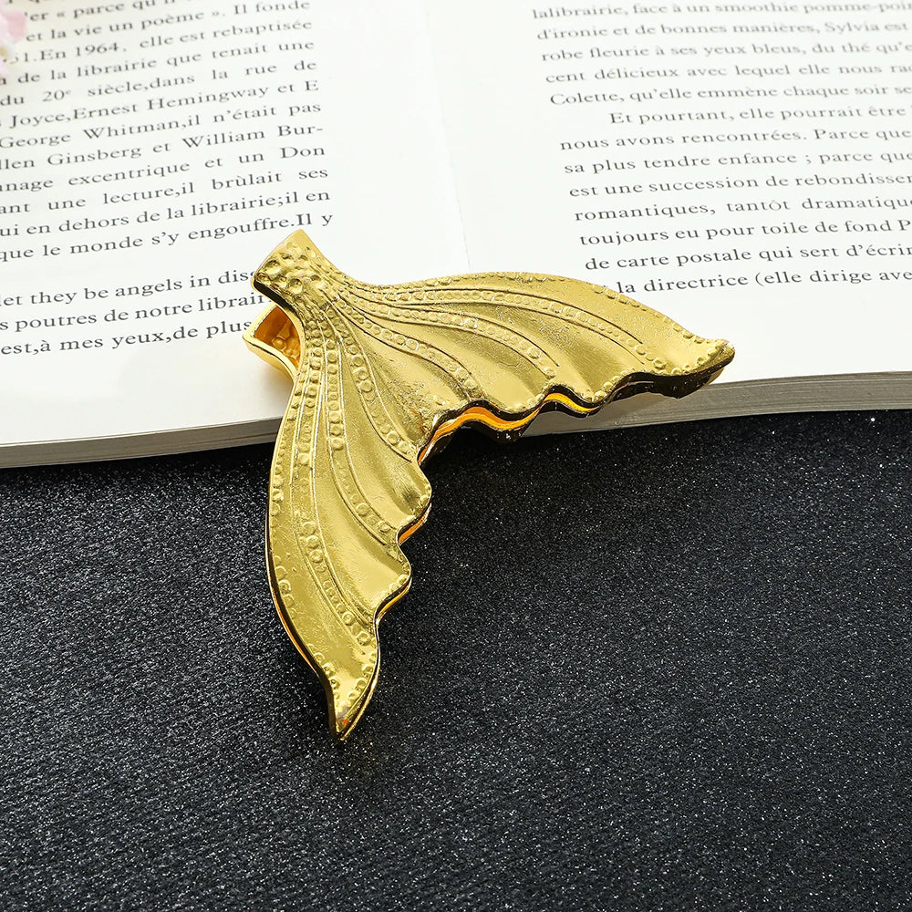 1 marque-page créatif en métal en forme de queue de poisson, support de page de livre rare pour les amateurs de livres, fournitures de bureau pour les lecteurs passionnés de lecture.