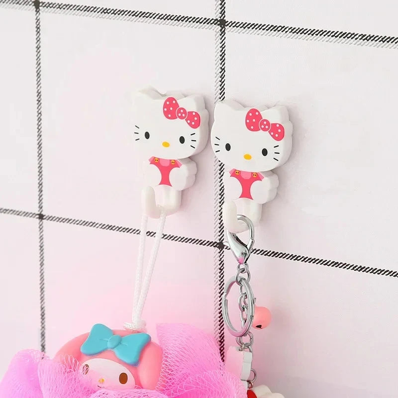 Juego de 2 ganchos adhesivos de pared Sanrio Hello Kitty con dibujos animados, resistentes y autoadhesivos, para cocina, baño, accesorios de almacenamiento para el hogar.