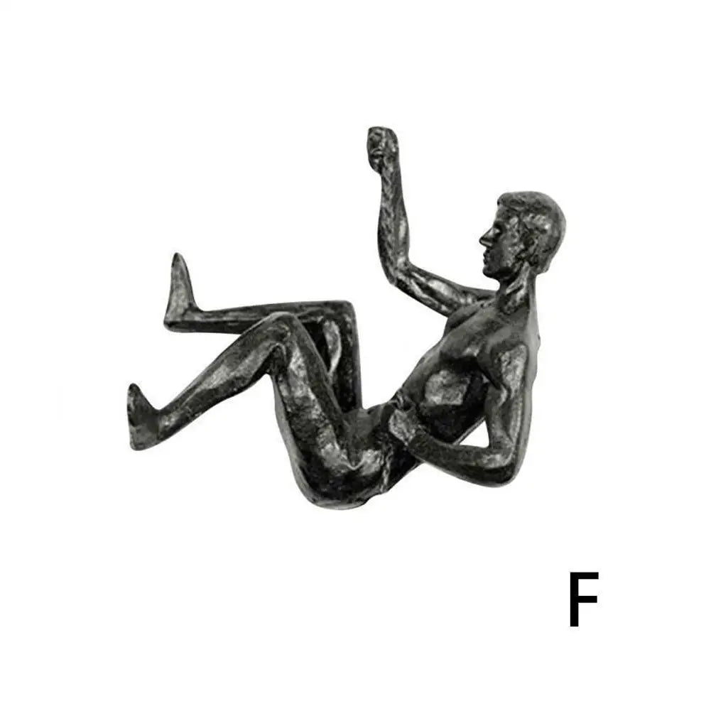 Escultura de resina de atleta moderna y sencilla para Navidad de 2024, escultura creativa de hombre escalador, escultura de pared acabada a mano para arte mural.