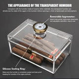 Boîte à cigares Scotte en acrylique avec hygromètre et humidificateur pour 20 cigares. Comprend un coupe-cigare et des accessoires pour perforer les cigares.