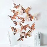 Lot de 12 autocollants muraux 3D en forme de papillon creux pour chambre à coucher, salon, décoration murale à faire soi-même, papier peint de mariage, décoration d'intérieur