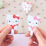 Juego de 2 ganchos adhesivos de pared Sanrio Hello Kitty con dibujos animados, resistentes y autoadhesivos, para cocina, baño, accesorios de almacenamiento para el hogar.