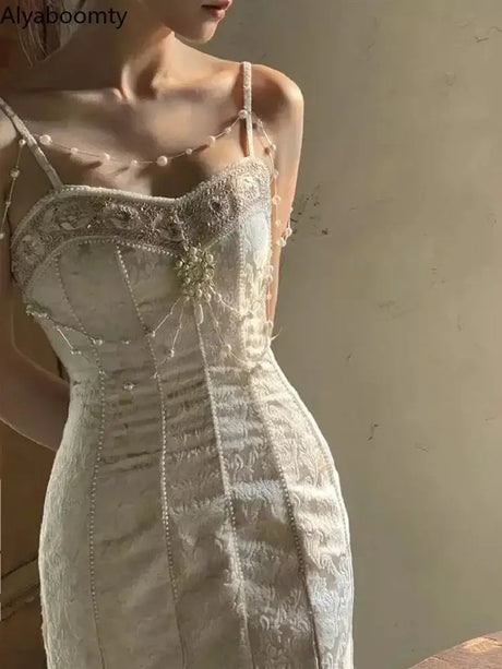 Summer Women Gorgeous Party Mermaid Prom Dress Spaghetti Strap Pearl Beading Ruffles Dress Feminine Backless Trumpet Long Dress - Lootquake