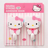 Juego de 2 ganchos adhesivos de pared Sanrio Hello Kitty con dibujos animados, resistentes y autoadhesivos, para cocina, baño, accesorios de almacenamiento para el hogar.