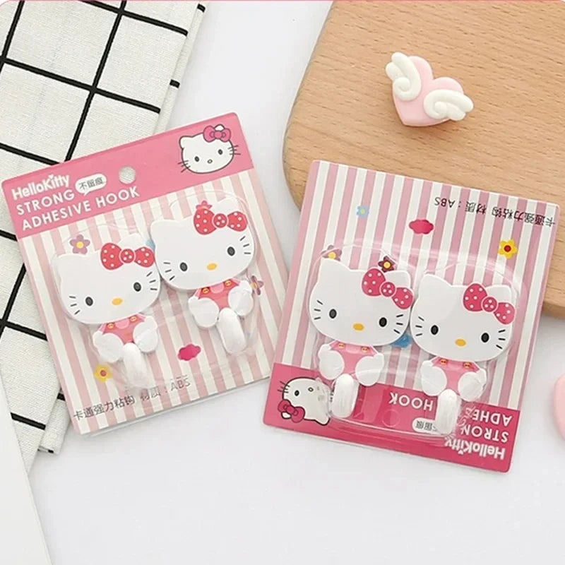 Juego de 2 ganchos adhesivos de pared Sanrio Hello Kitty con dibujos animados, resistentes y autoadhesivos, para cocina, baño, accesorios de almacenamiento para el hogar.