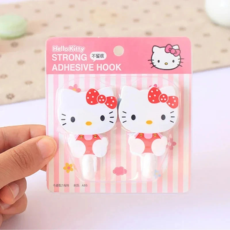 Juego de 2 ganchos adhesivos de pared Sanrio Hello Kitty con dibujos animados, resistentes y autoadhesivos, para cocina, baño, accesorios de almacenamiento para el hogar.