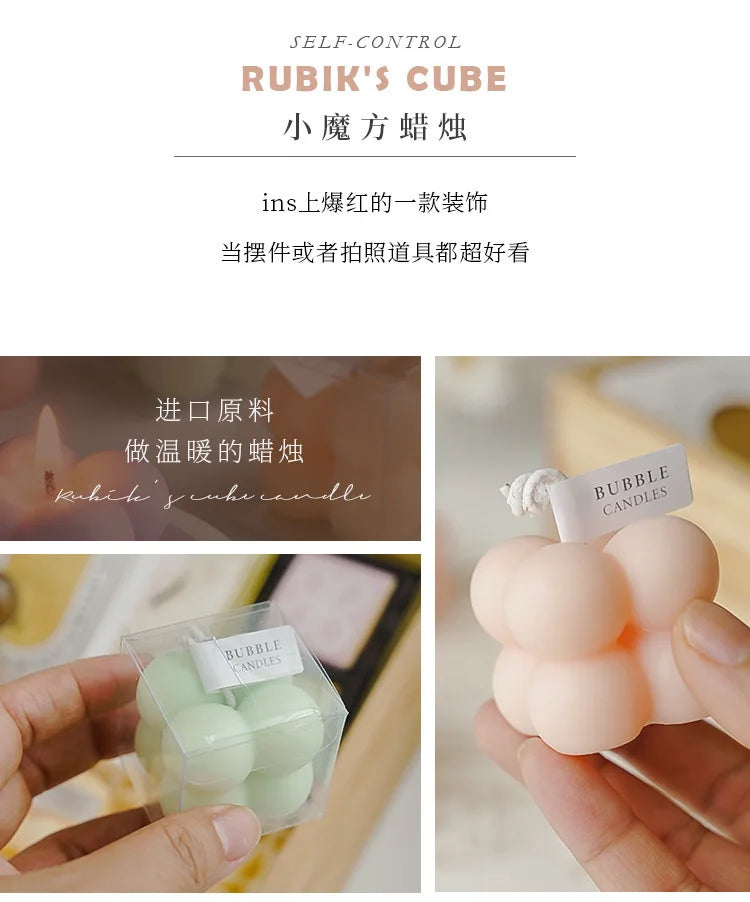 Une bougie parfumée en forme de boule carrée, un cadeau d'anniversaire coloré, une bougie artisanale et une bougie parfumée de forme mignonne