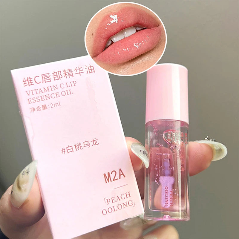 Aceite de esencia labial con vitamina C Aceite labial Líquido labial hidratante Prebase hidratante Mejora las líneas de los labios y elimina la piel muerta