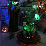 Décoration d'Halloween en plein air, grand chaudron de sorcière sur trépied avec lumières, seau à bonbons, feu de joie d'Halloween, décoration de fête de carnaval d'horreur