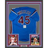 Camiseta de béisbol retro azul de Filadelfia de 35 x 39, enmarcada, autografiada y firmada por Zack Wheeler. Certificado de autenticidad de PSA y ADN.