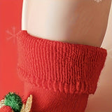 1 par de calcetines navideños para niña, adorables accesorios navideños con dibujos en 3D, calcetines gruesos de algodón con lazo, calcetines rojos antideslizantes.