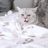 Couverture douillette pour animaux de compagnie avec motif empreinte de patte - Tapis en polaire douce pour chien et chat, housse de coussin chaude pour le confort et les câlins du chiot