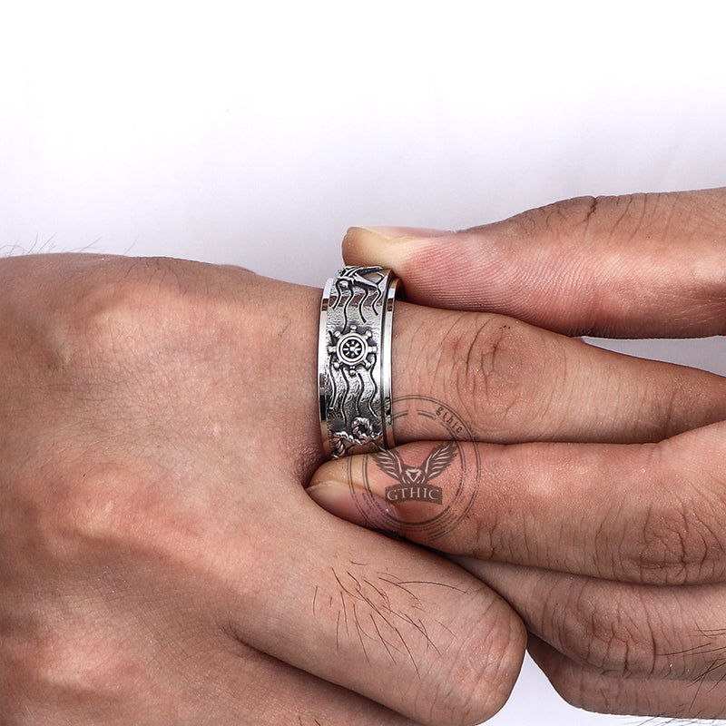 Anillo giratorio de acero inoxidable con brújula y ancla